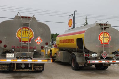 two shell gasoline tanks